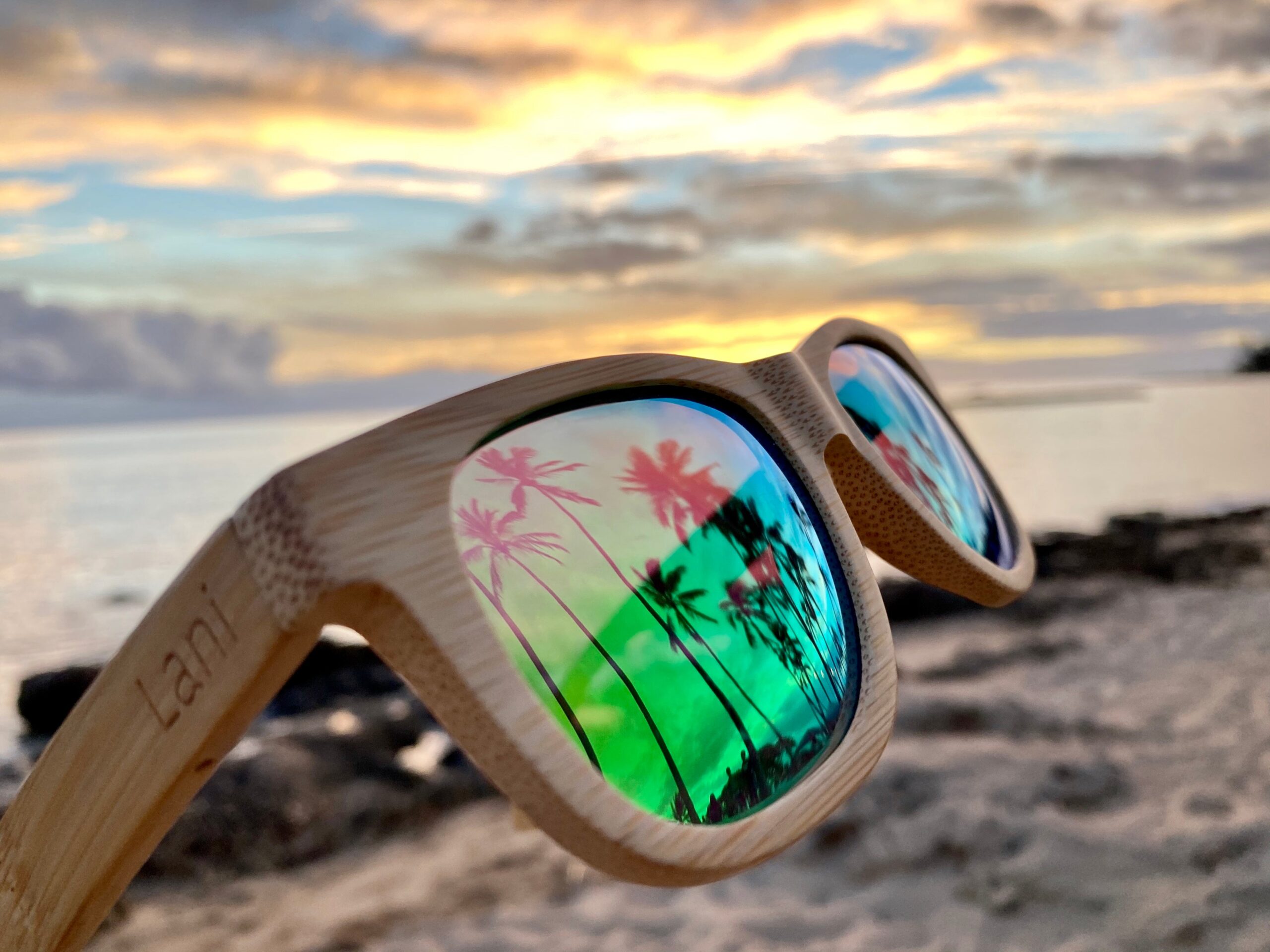 polarized sunglasses on ocean beach